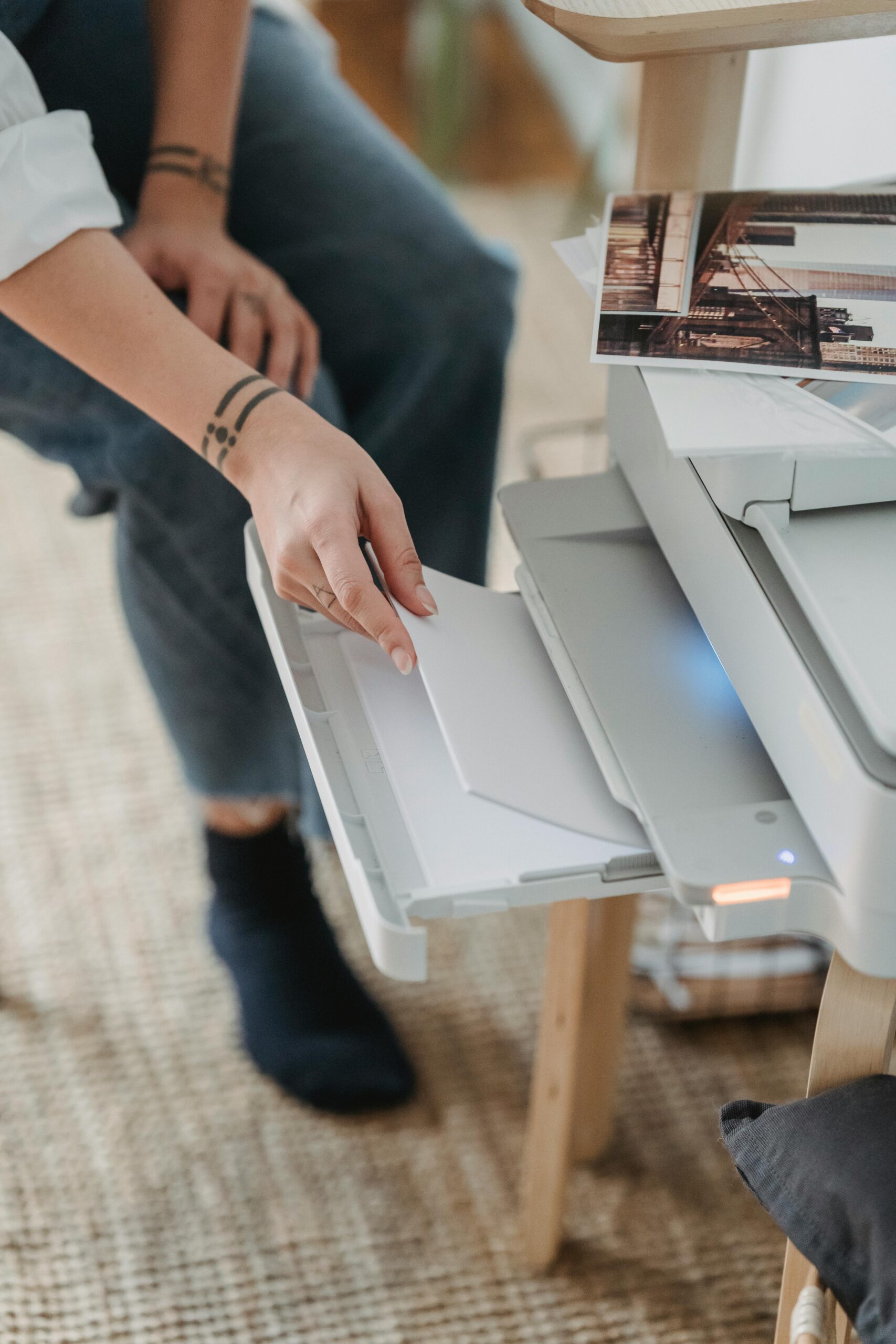 person considering Copy Machine Leasing vs. Buying while using one